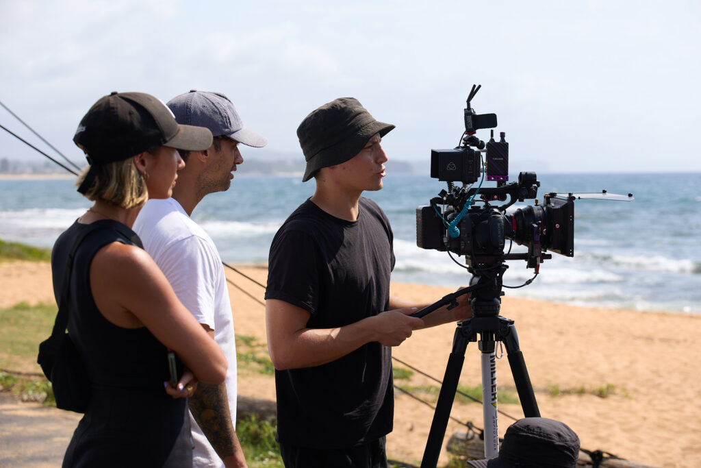 A producer, director, and DOP on a commercial set.